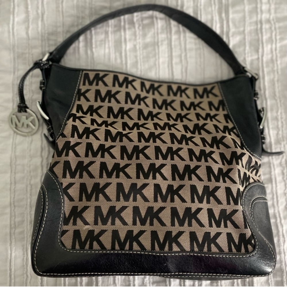 Michael Kors Tan and Black Shoulder Bag with Monogram Pattern and Slouchy Shape